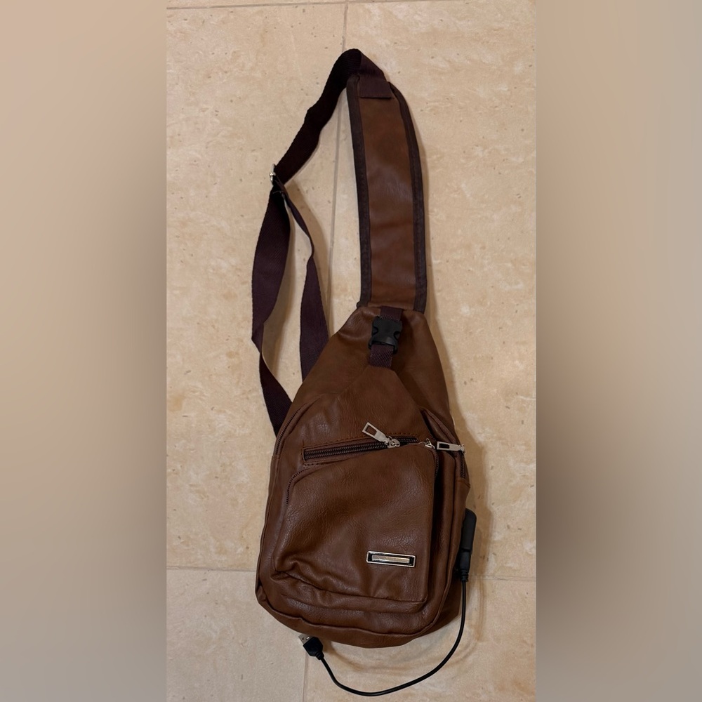 Brown Leather Sling Bag Shoulder Crossbody USB opening & cable . Used